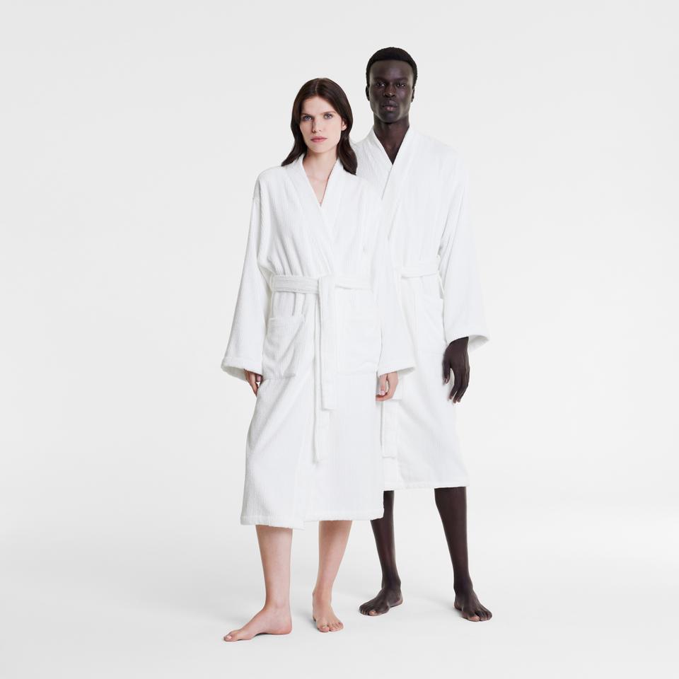 Our first model is 179cm and is wearing a size Small/Medium, Our second model is 191cm and is wearing a size Large/X-Large.