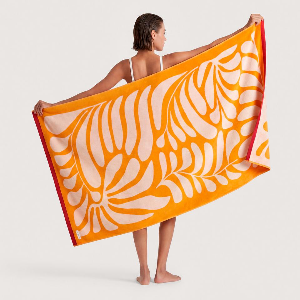 Radia Beach Towel in mandarin