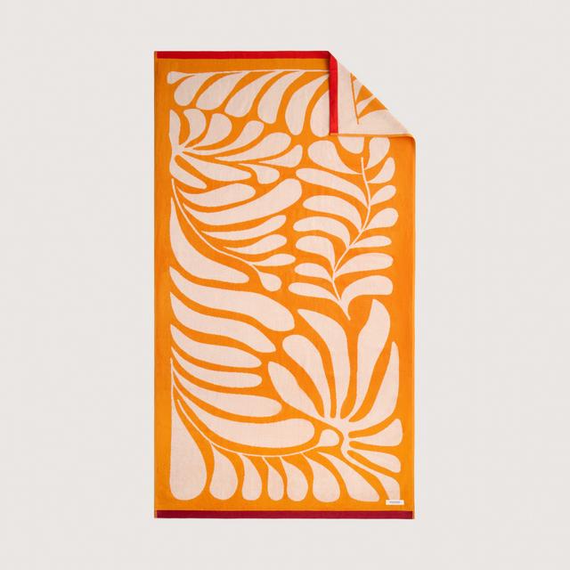Radia Beach Towel in mandarin